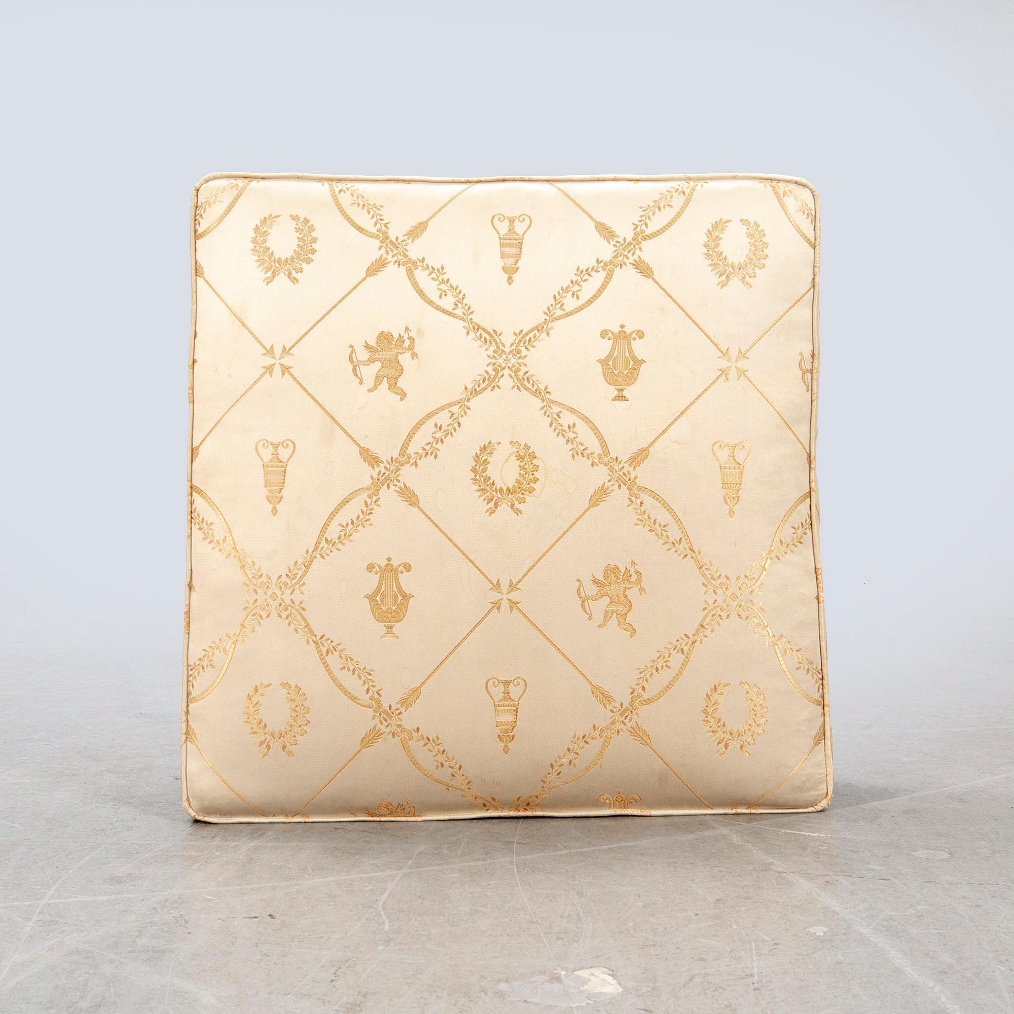 An Empire style mahogany stool around 1900.