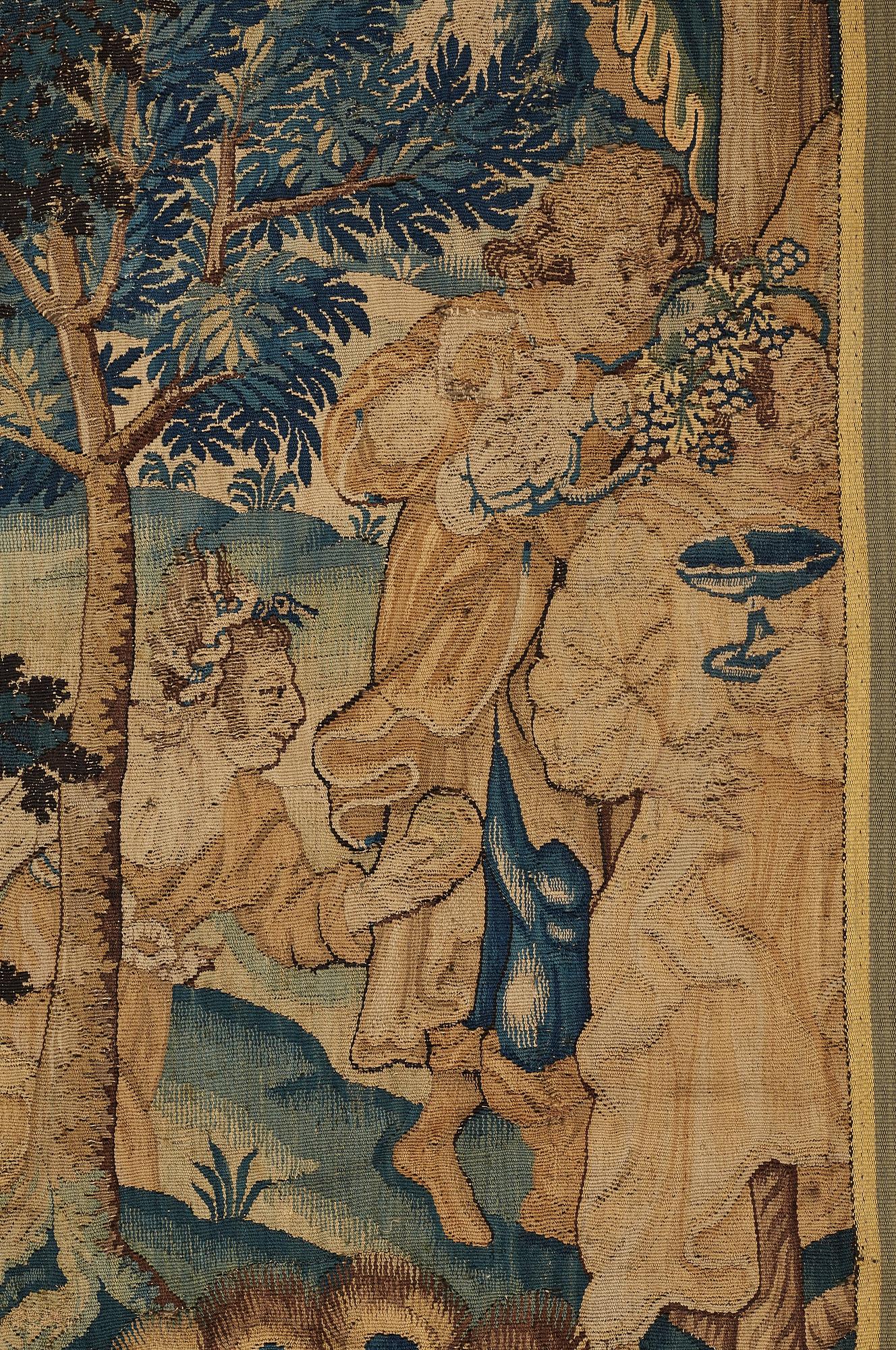 A TAPESTRY FRAGMENT, tapestry weave, ca 256,5 x 115 cm, Flanders/France the 17th century.