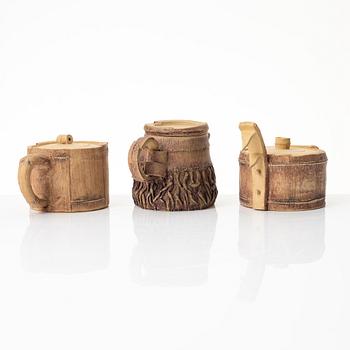 A group of three bright yellow yixing 'Gongfu' teapots, China, 1990s.