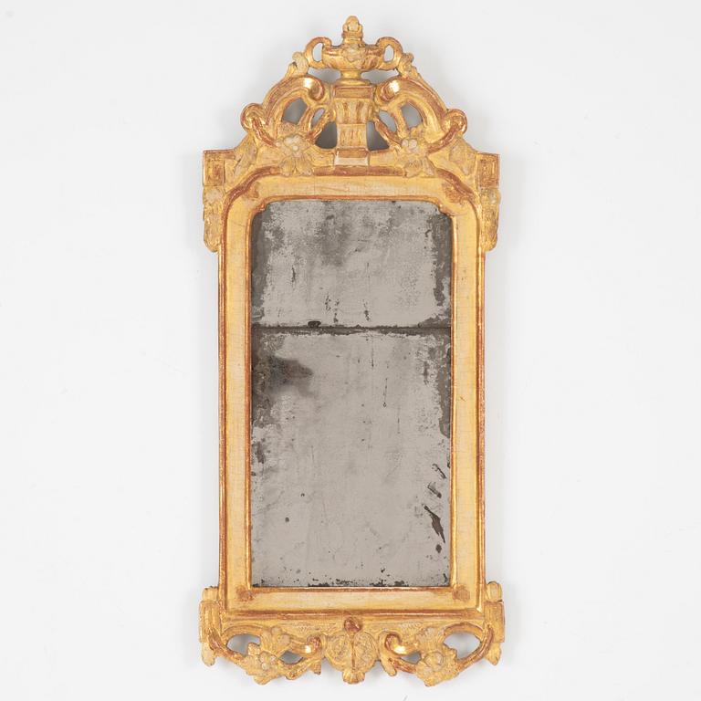 A Swedish rococo giltwood mirror, Stockholm, later part 18th century.