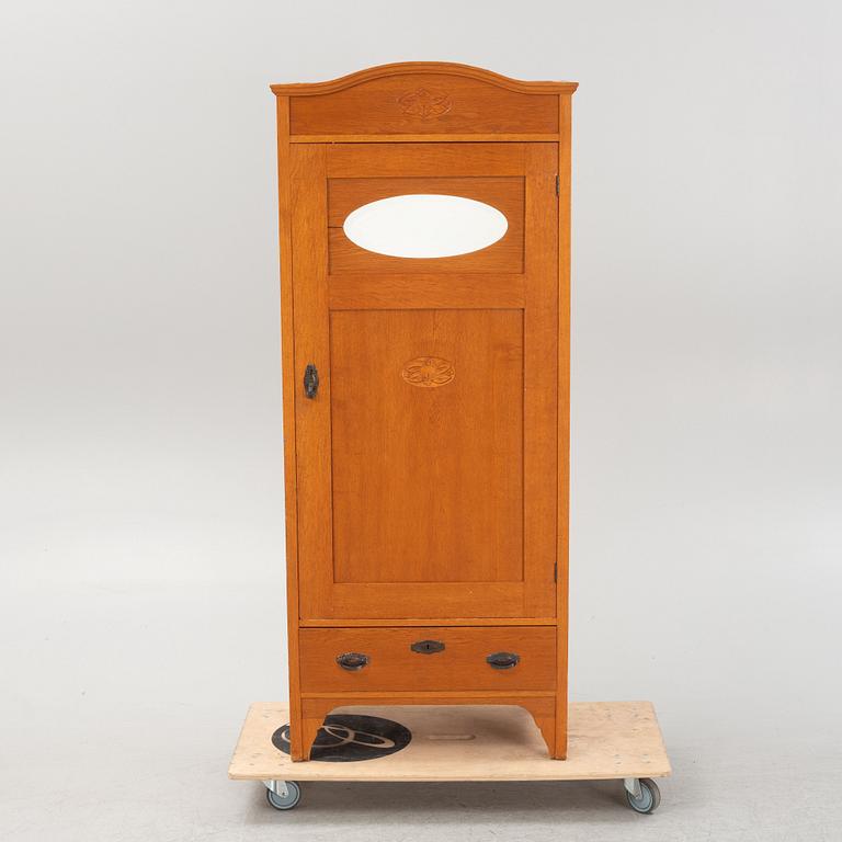 A cabinet, early 20th Century.