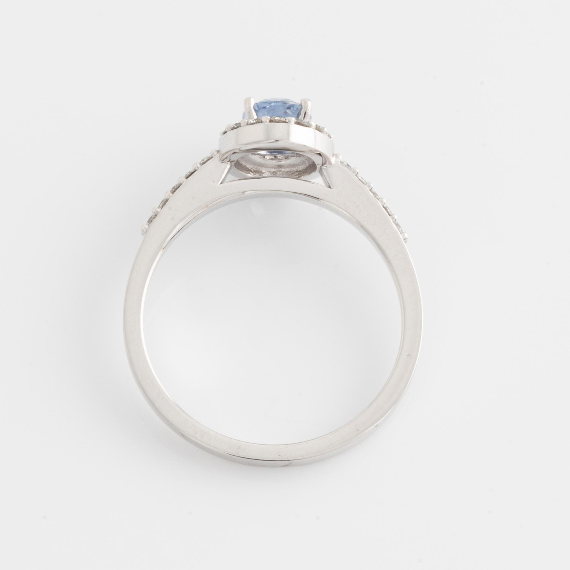 Ring with oval sapphire and brilliant-cut diamonds.