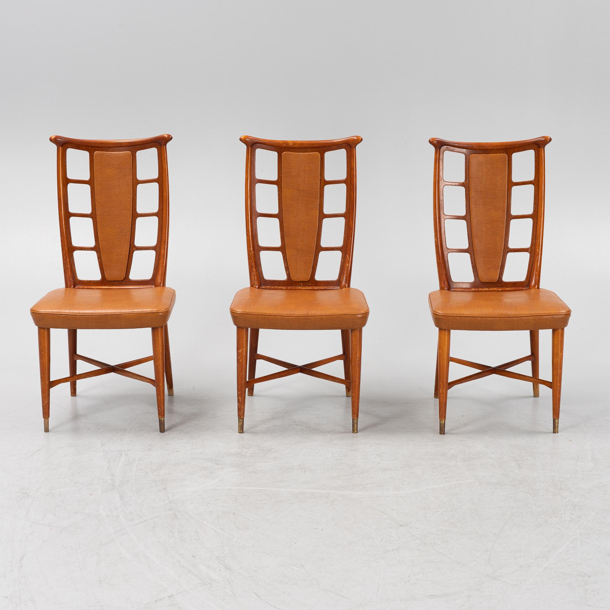 Three beech and mahogany chairs, mid 20th Century.
