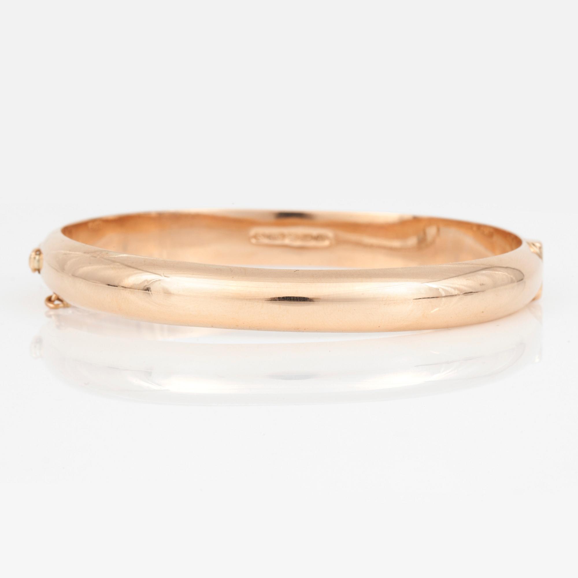 ARMRING, 14K guld.  Finland 1965. Total vikt 14,2 g.