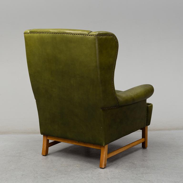 RAGNAR HELSÉN, a leather covered wing-chair 'Oxford' model 3543 from Svenskt Tenn/Stiernmöbler.