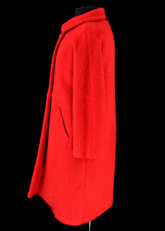 A 1960s/70s red wool coat by Jean Patou.