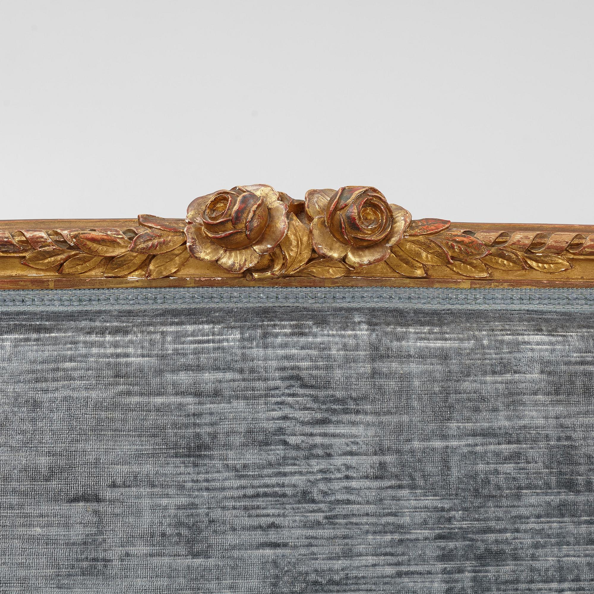 a gustavian style sofa from around 1900,