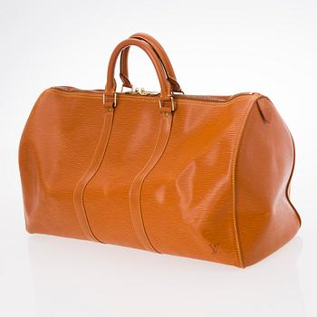 A LOUIS VUITTON CIPANGO GOLD KEEPALL 50 EPI TRAVEL BAG.