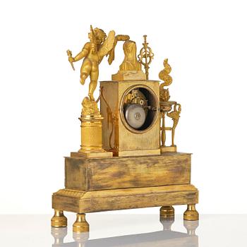 A French Empire ormolu figural mantel clock, early 19th century.
