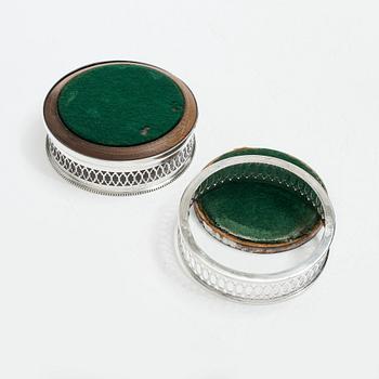 Two English silver coasters, mark of E Edmonds, Birmingham, 1930 and C J Vander Ltd, London 1969.