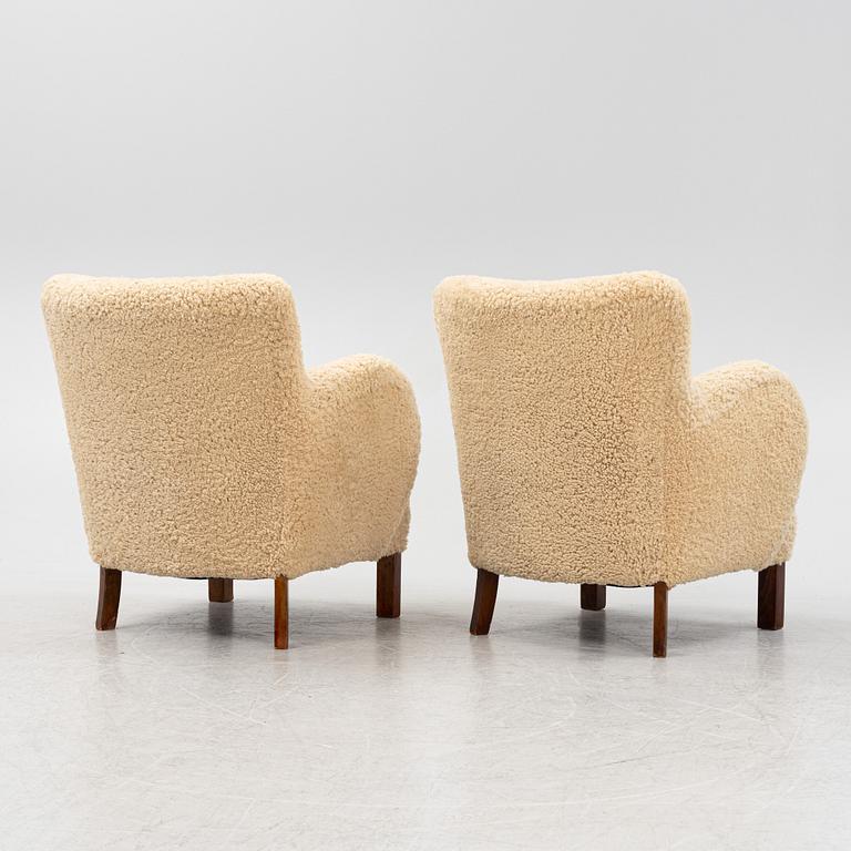 A pair of Danish Modern armchairs, 1940's/50's.