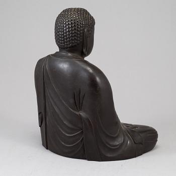 A Japanese buddha sculpture, late 20th Century.