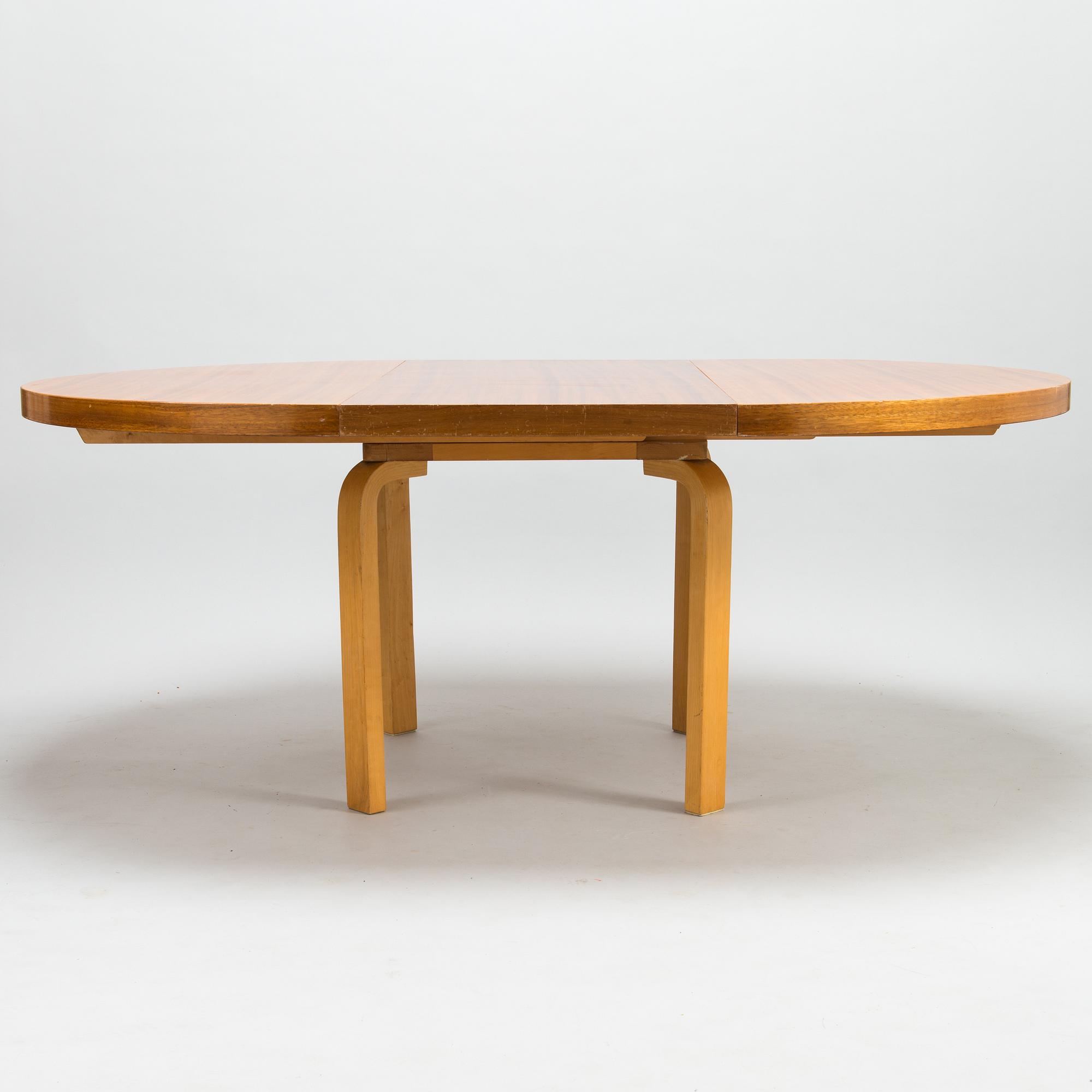 ALVAR AALTO, A 1950s dinner table, O.Y. Huonekalu- ja Rakennustyötehdas A.B., Finland.