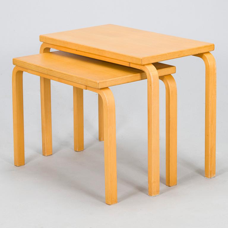 Alvar Aalto, a 1980s 2-piece nesting table, '88A' and '88B', for Artek.