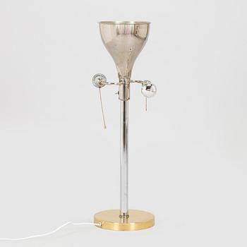 A mid-20th century floor/tablelamp, France.