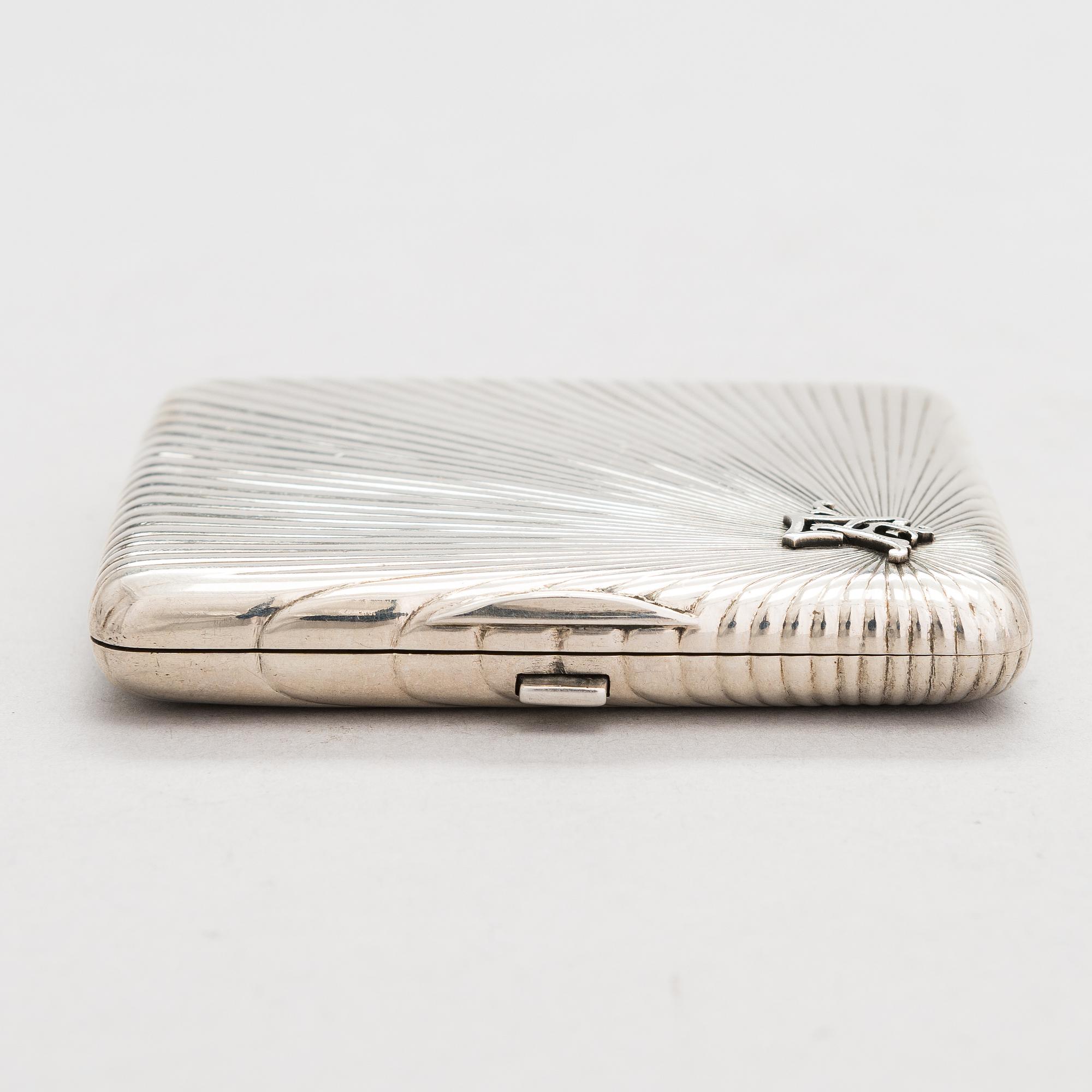 A silver cigarette case, maker's mark of Johan Allenius, Saint Petersburg, Russia 1898.