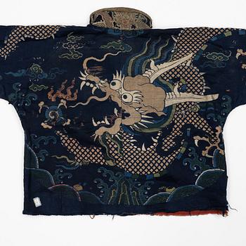 A rare fragment of a silk four clawed 'dragon' jacket, late Ming dynasty/early Qing dynasty.