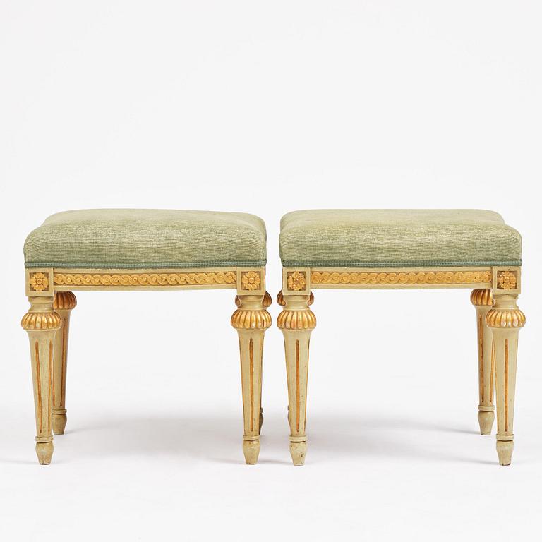 A pair of stools in the manner of Erik Öhrmark (master in Stockholm 1777–1813), Gustavian.