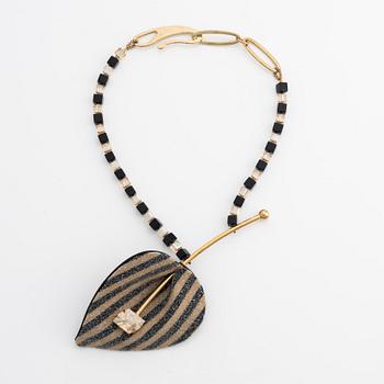 Giorgio Armani, necklace and brooch,