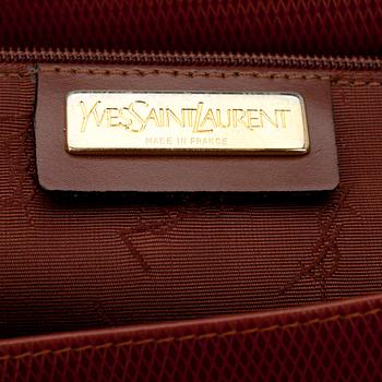 PORTFÖLJ, Yves Saint Laurent.