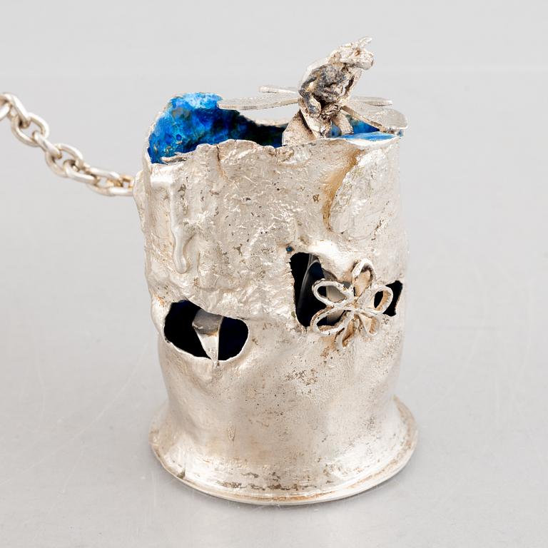 A sterling silver sculpture in two parts with a chain, mark of Lars Arby, Gothenburg, Sweden 1976.