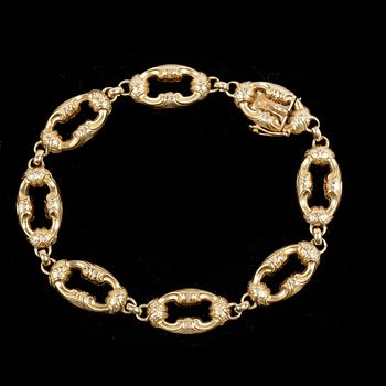 ARMBAND, 18k guld. Omkring 1800/1900. Vikt 11,7g.