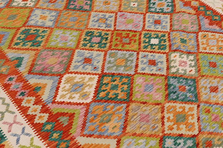 A carpet, Kilim, ca 299 x 222 cm.