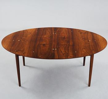 Finn Juhl, A Finn Juhl rosewood 'Judas' dining table, executed by Niels Vodder, Denmark 1960's.