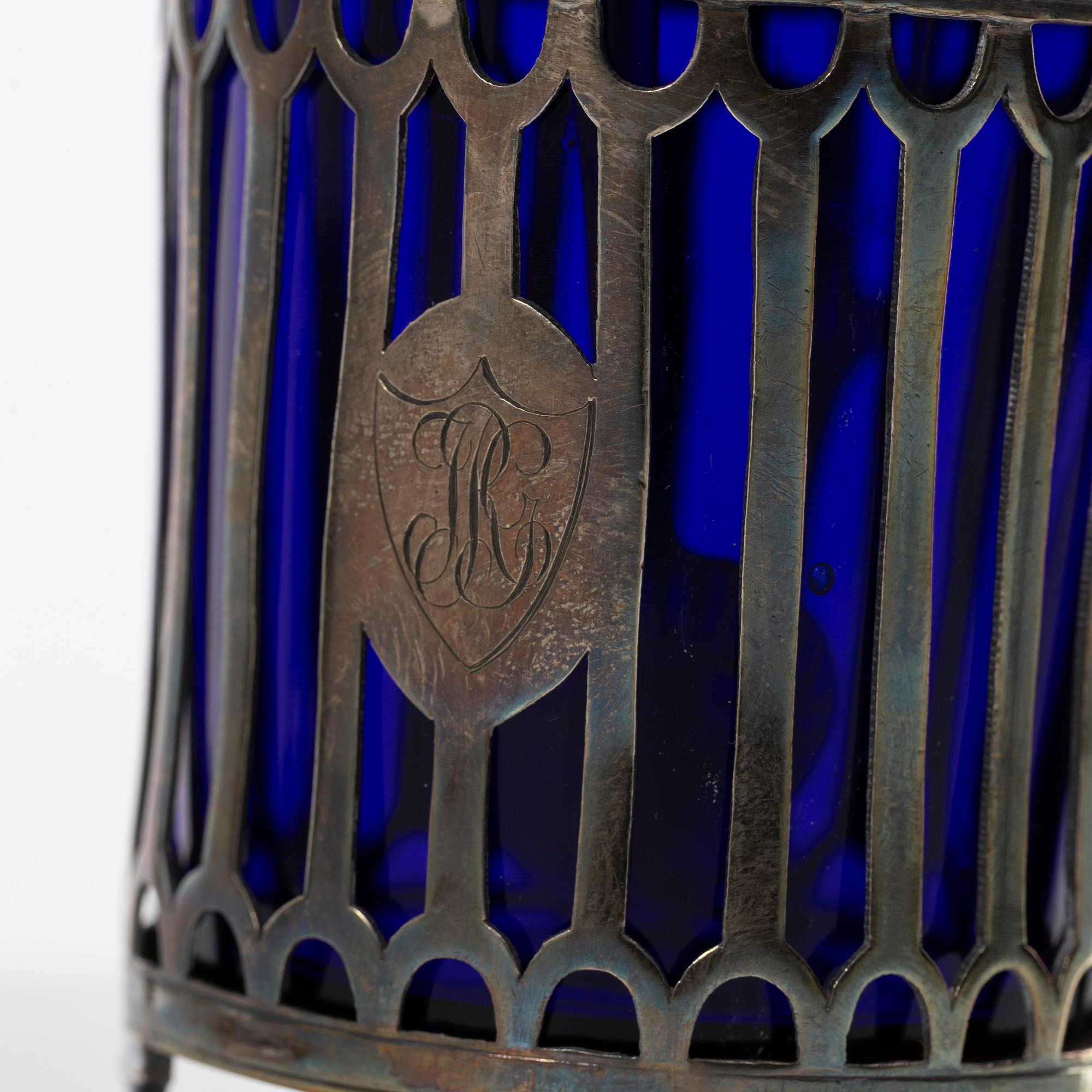 Two silver salt cellars, and a mustard pot, French hallmarks, late 18th Century.