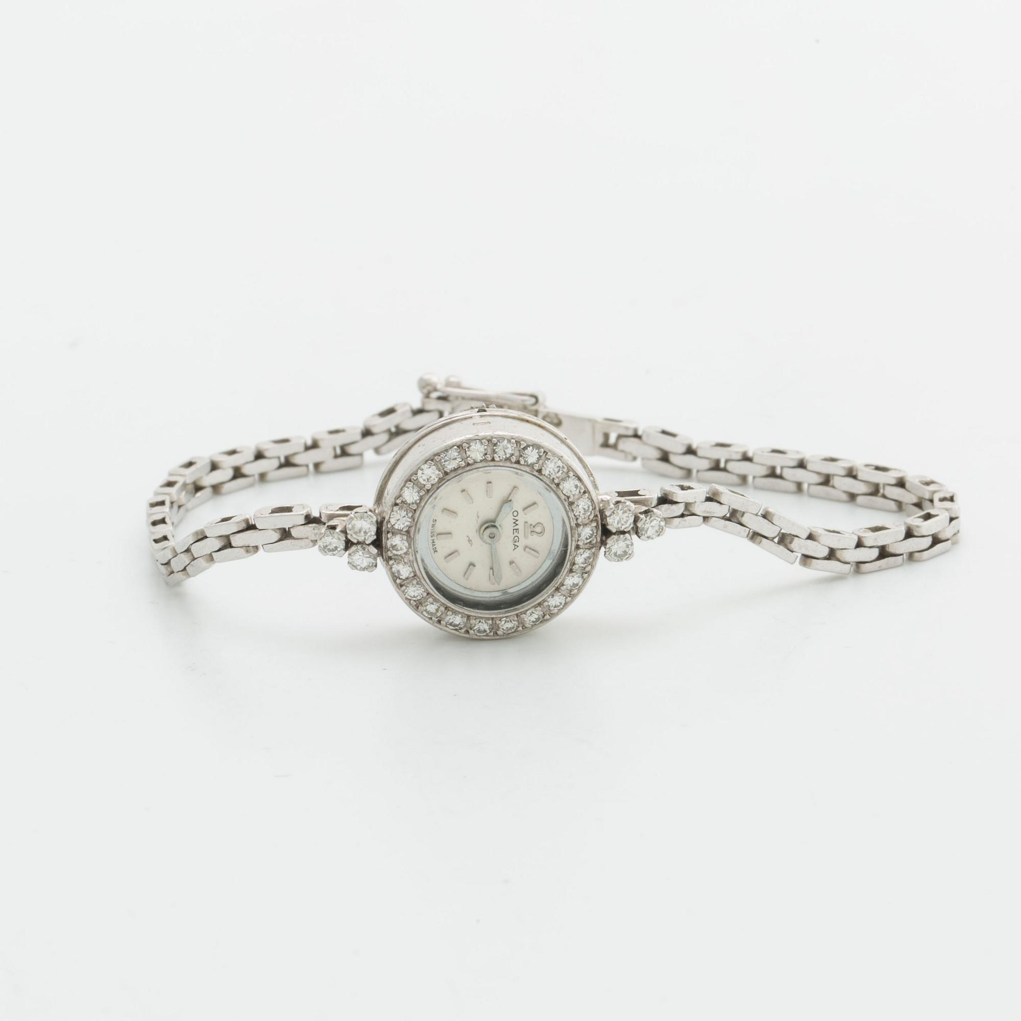 OMEGA ladies wristwatch, 15 mm, 18K whitegold, brilliant-cut diamonds approx 0,40 ct in total.