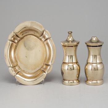 A pair of Tiffany & Co. silver-gilt sterling silver salt- and pepper grinder set.