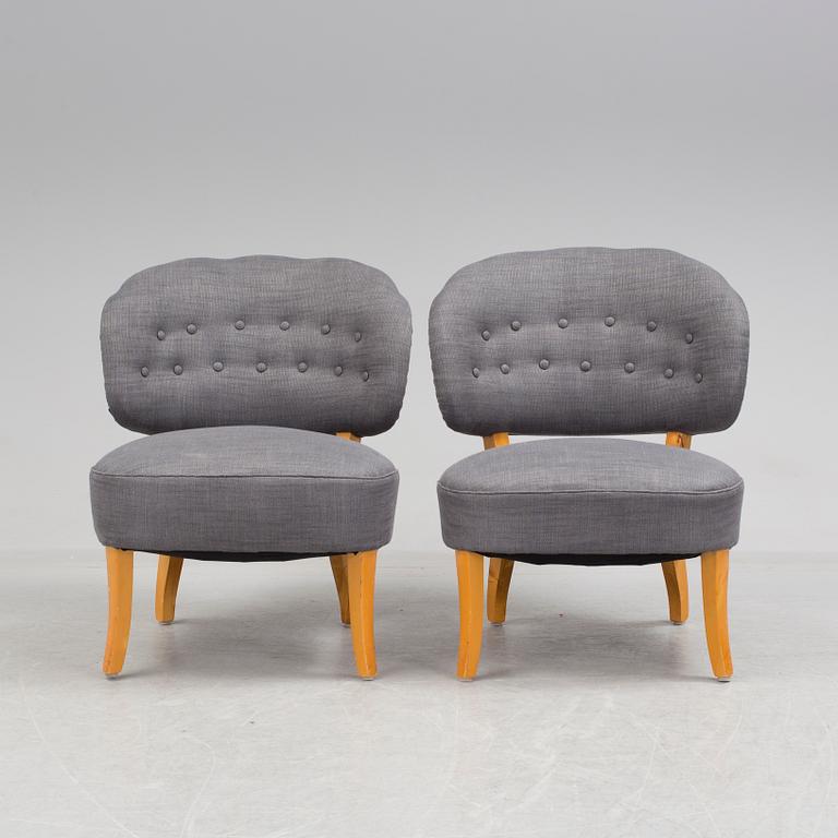 A pair of "Gamla Berlin" easy chairs by Carl Malmsten.