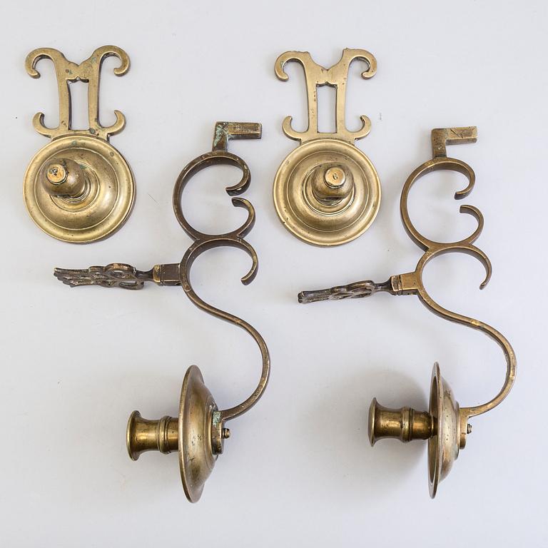 A PAIR OF BRONZE WALL LIGHTS, 17th/18th century.