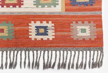 Märta Måås-Fjetterström, a carpet, 'Röd grön äng', flat weave, c. 345 x 251 cm, signed AB MMF.