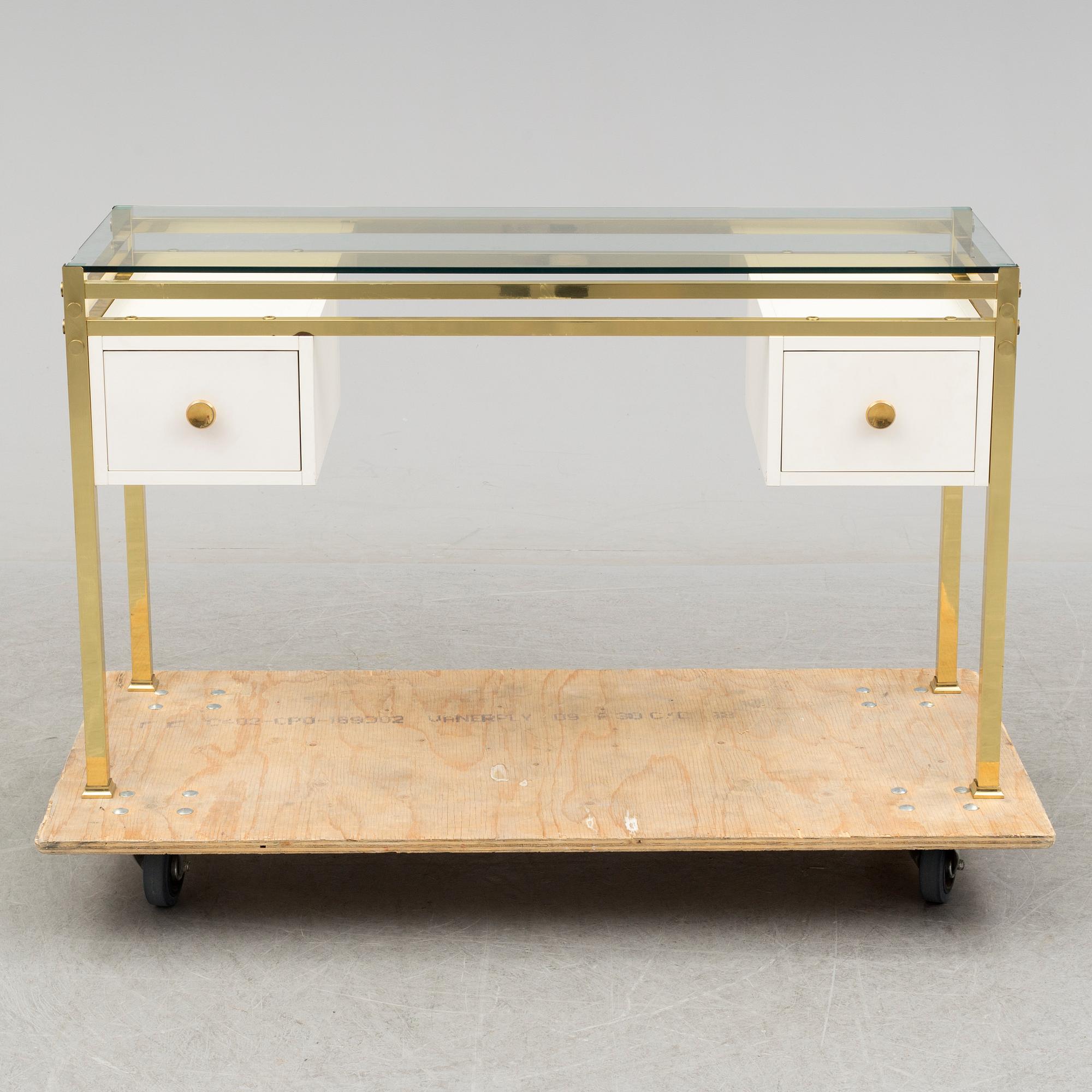 A 1980's dressing table with glasstop.
