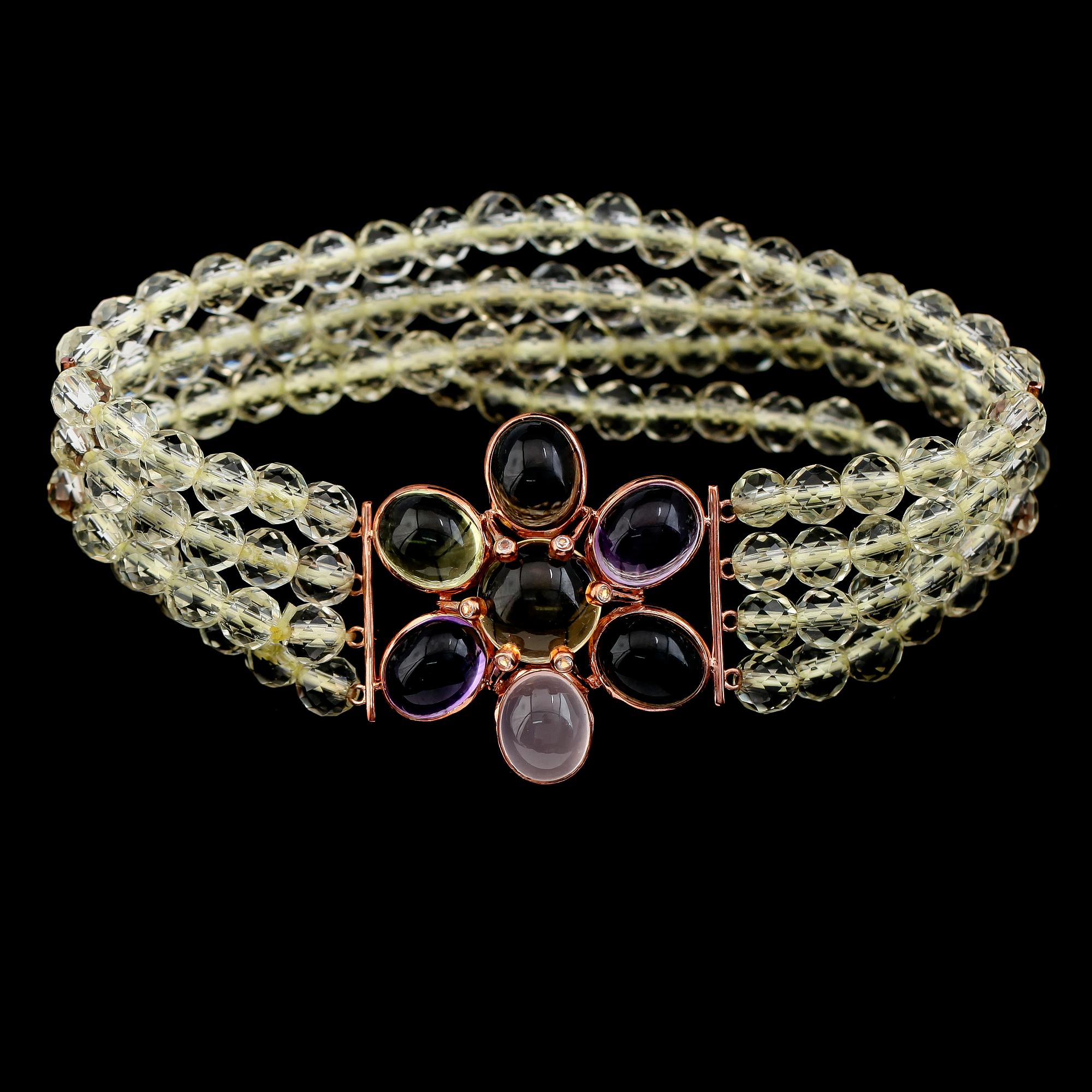 ARMBAND, silver förgyllt i roséguld, olikfärgade ädelstenar.