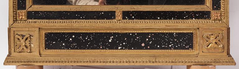 A late Gustavian giltwood and faux-porphyry mirror, late 18th century.