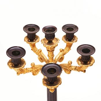 A pair of French Louis Philippe six light candelabra, around 1830.