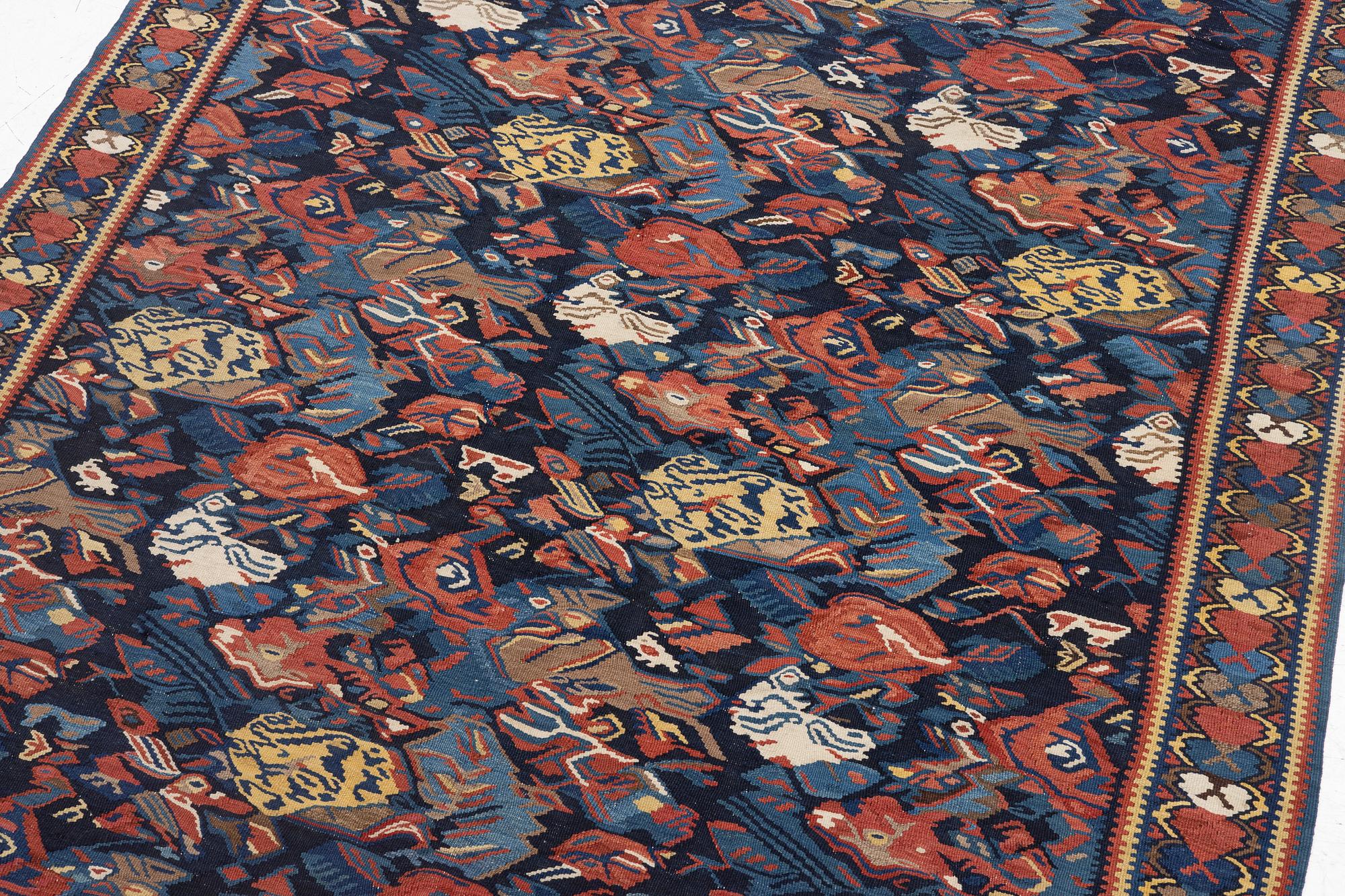A Kilim rug, Senneh, approx. 199 x 132 cm.