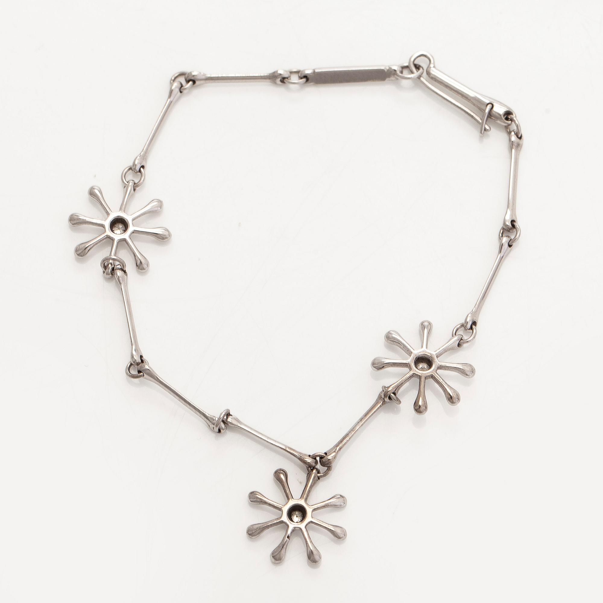 Kalevala Koru, armband, "Polaris", 18K vitguld och briljantslipade diamanter, Kirsti Doukas, 2009.