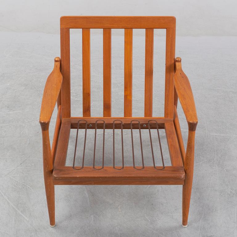 A 1950's/60's teak and oak easy chair.