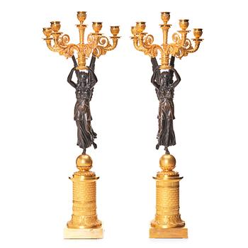 95. A pair of French Empire five-light candelabra attributed to Pierre Chibout / Chiboust, early 19th century.