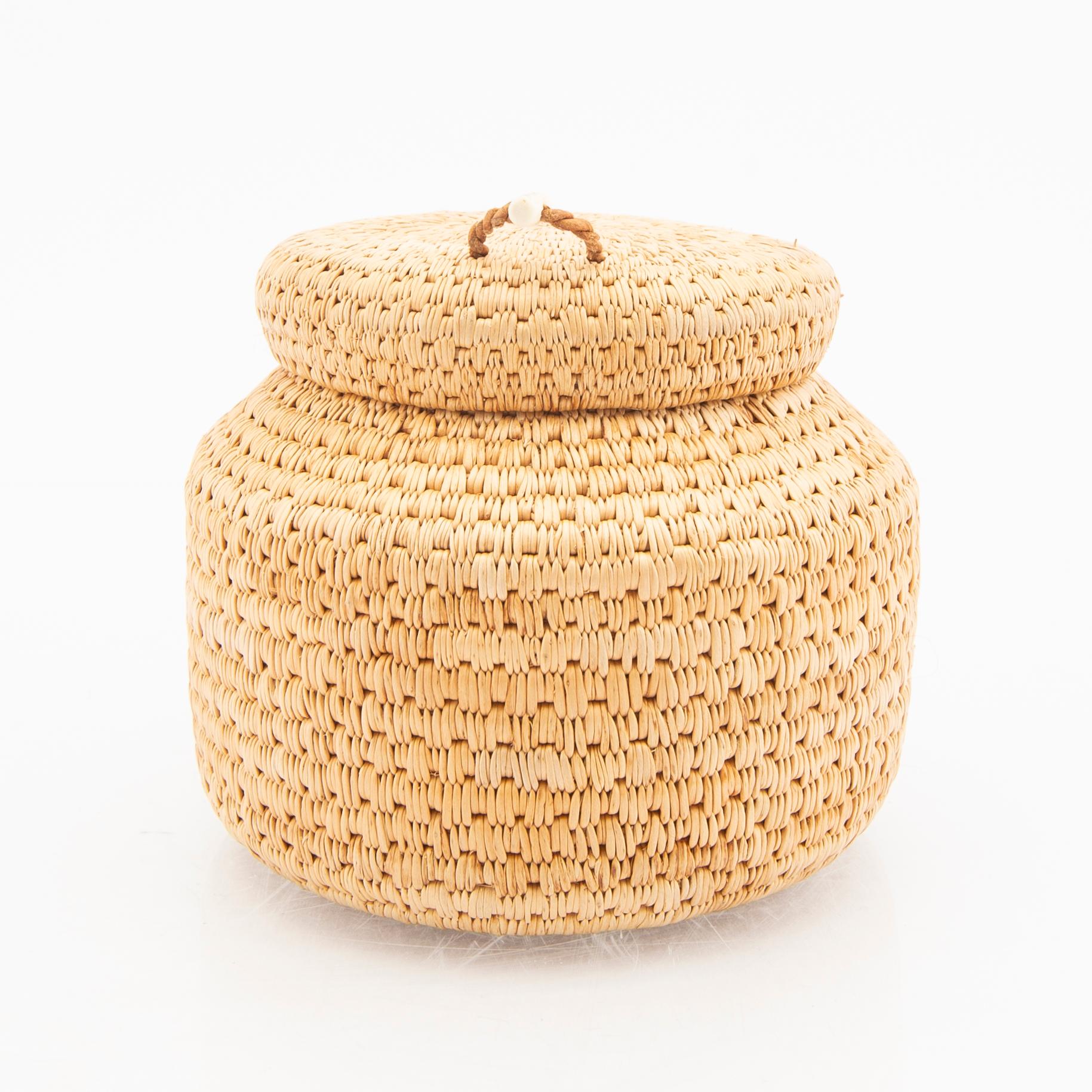 Margit Kitok-Åström, a signed box root work.