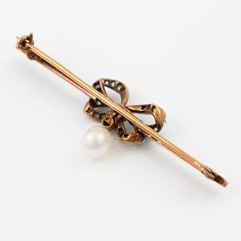 Brooch, 18K gold bow with old-cut diamonds and a pearl.