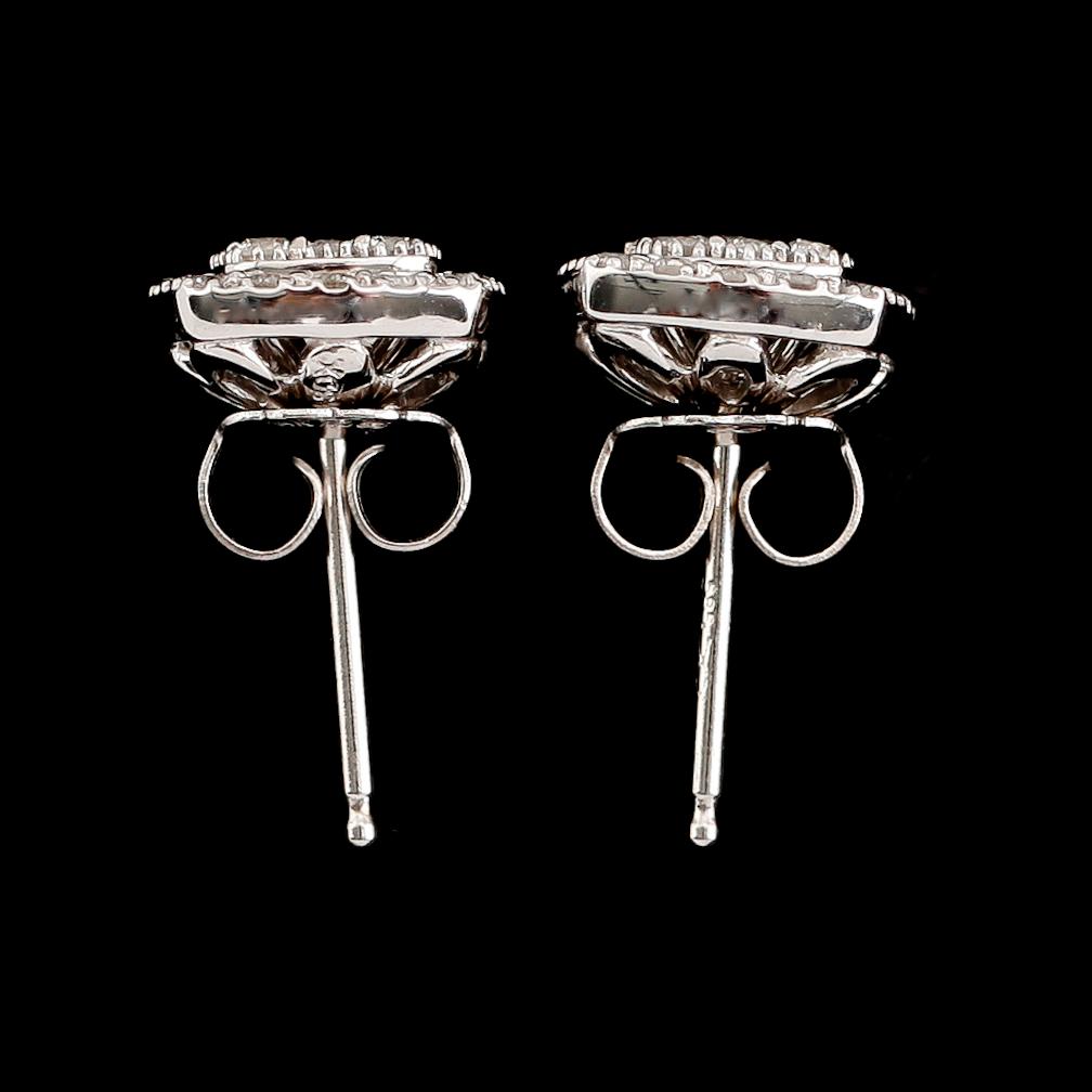 ÖRHÄNGEN, 1 par, 14 k vitguld, briljantslipade diamanter tot 0.67 ct.