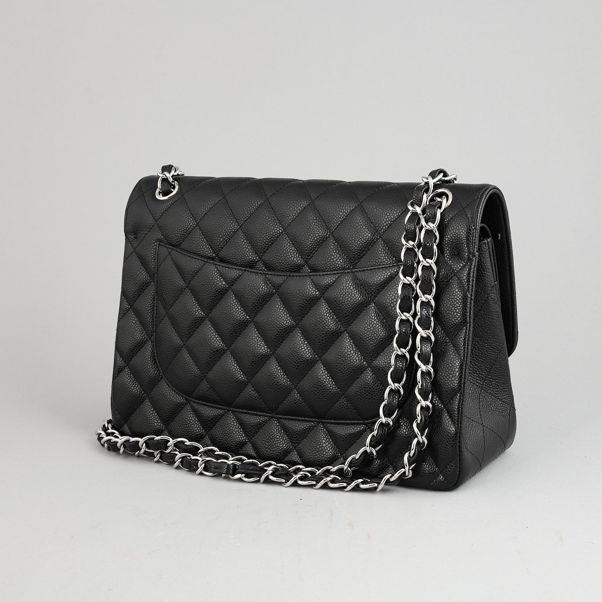 Chanel, a black caviar 'Jumbo Double Flap Bag', 2018.