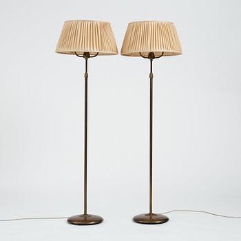 Nordiska Kompaniet, a pair of Swedish Grace floor lamps, 1930's.