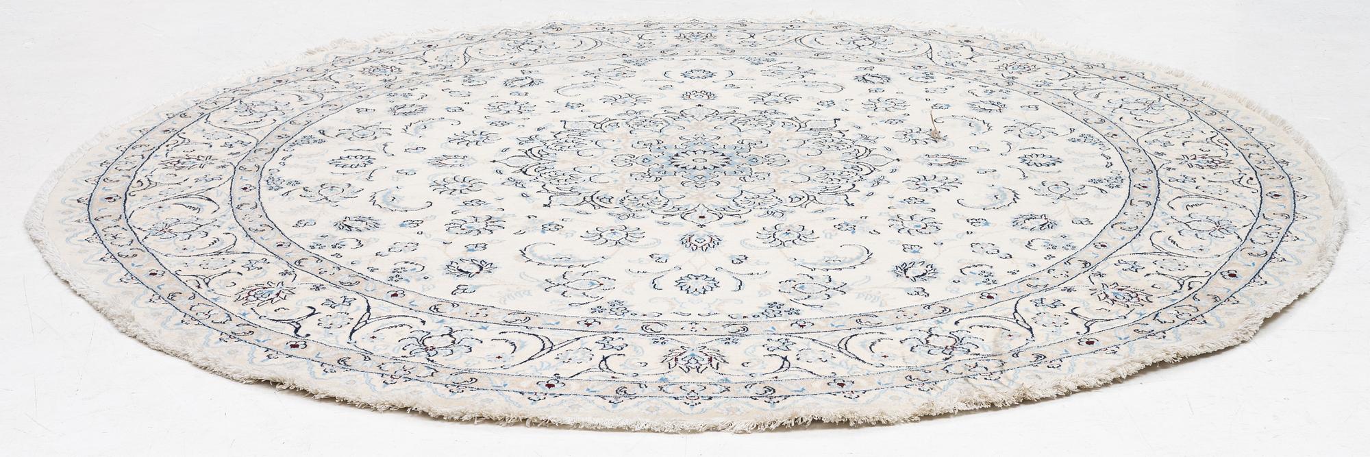 A Nain rug, diameter a. 247 cm.