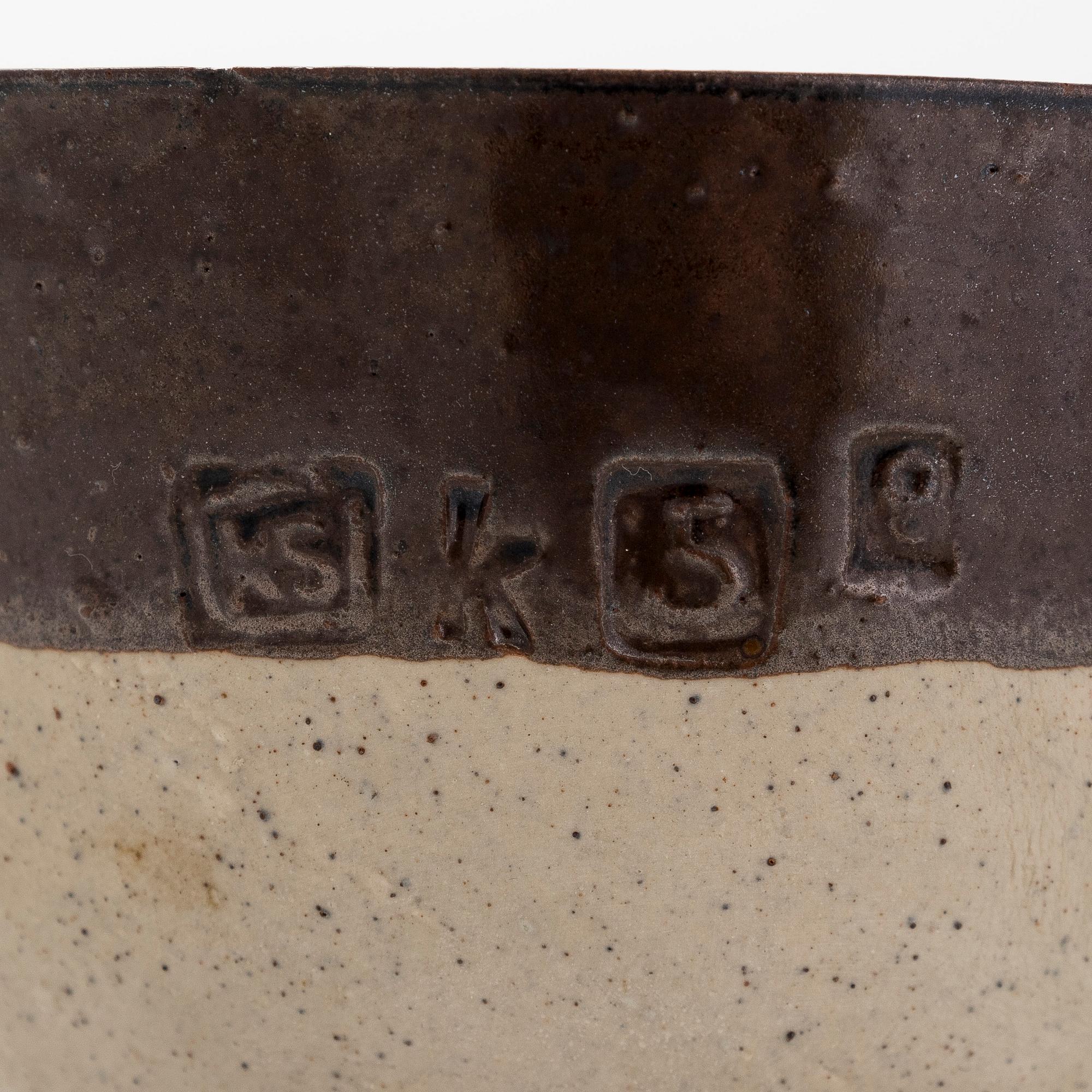 Kyllikki Salmenhaara, a stoneware tea strainer signed KS.