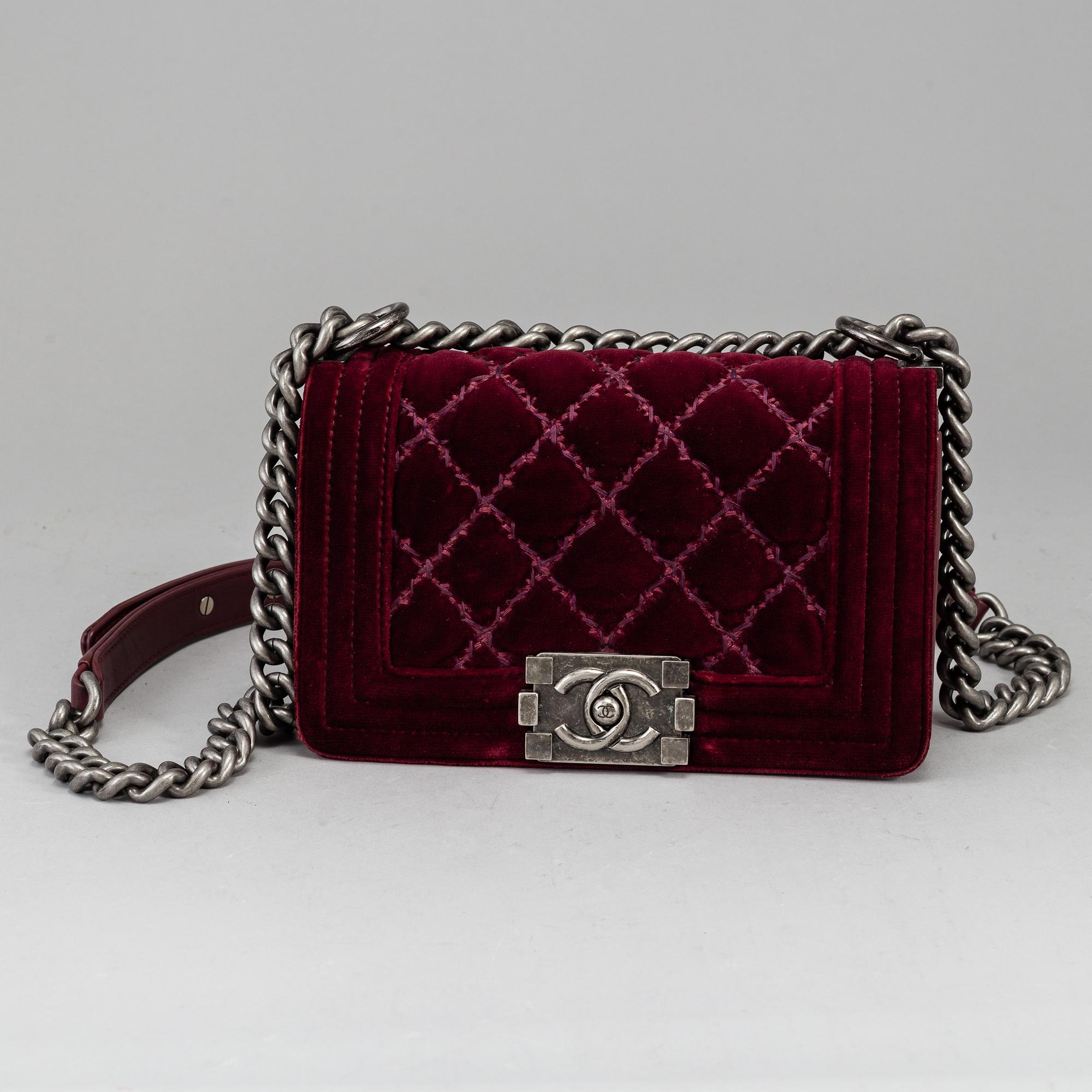 CHANEL, a burgundy quilted velvet 'Small Boy Bag'.